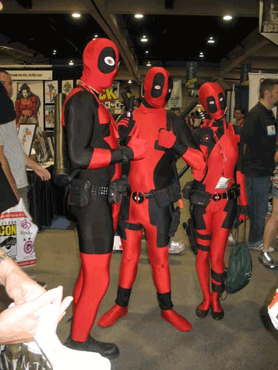 Three of about a dozen Deadpools at the show. And that's right: I think at least one's a girl.