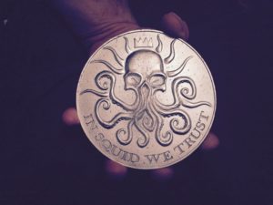 An early shot of the replica coin from Ben Templesmith's "The Squidder" sculpted by Jamie Macfarlane.